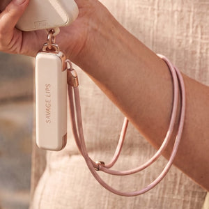 Lip Pod worn on the wrist